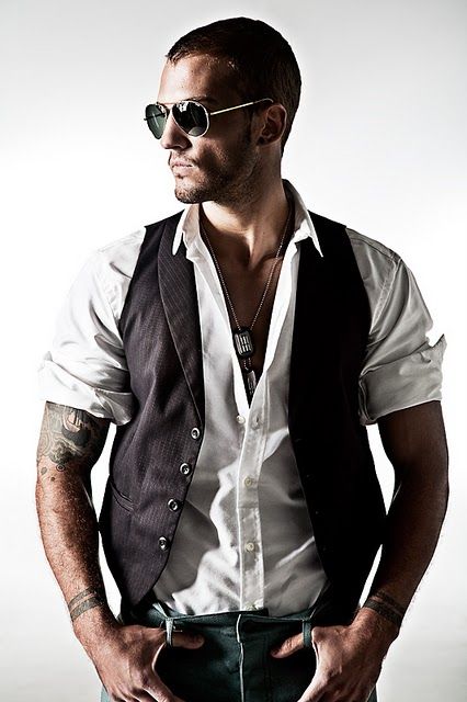 Man with Aviators and Leather Vest