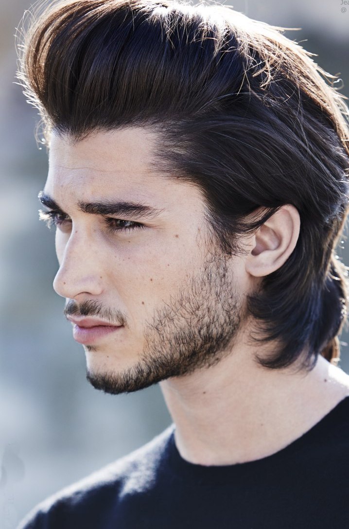 Men's hairstyle with a long lifted fringe a