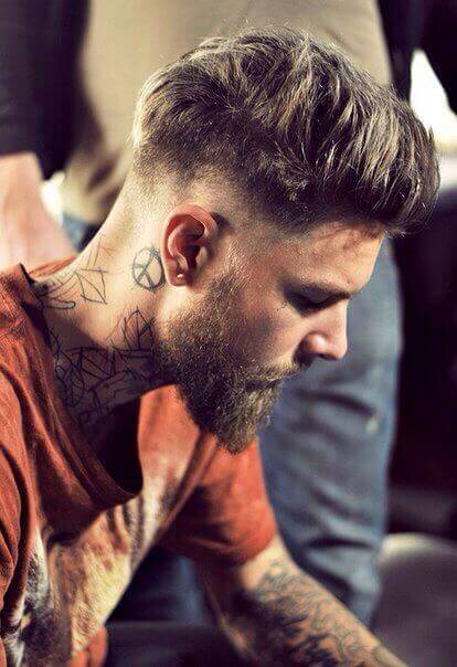 Undercut Haircut Men with Beard Tattoo