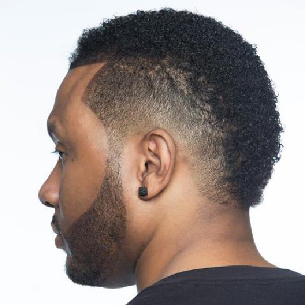 Usher Burst Fade Mohawk of Black Men Haircuts