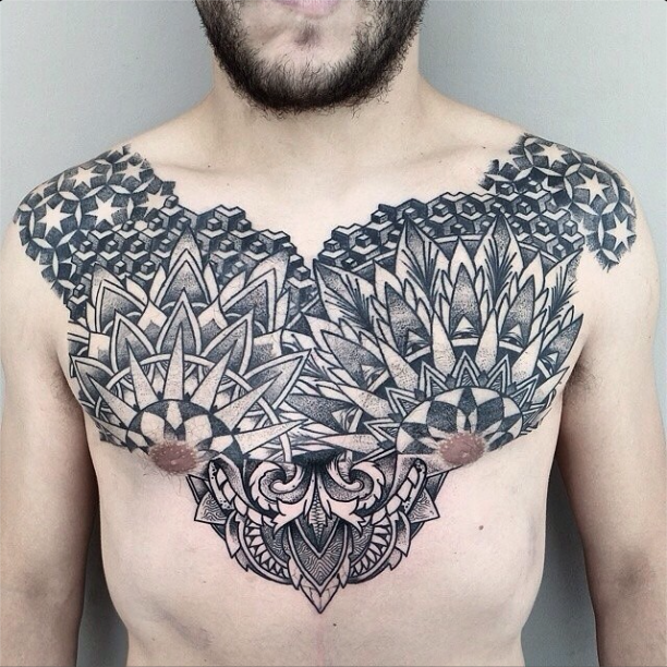 geometric tattoo chest