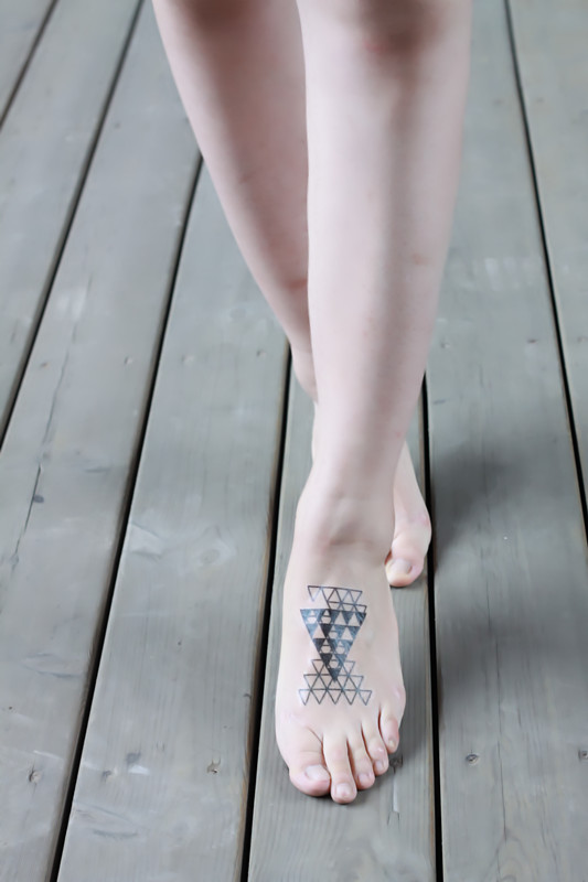  geometric tattoo foot