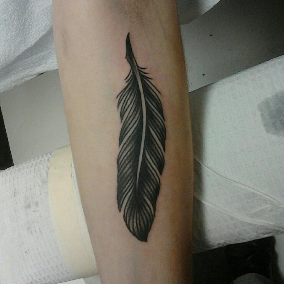 traditional feather tattoo