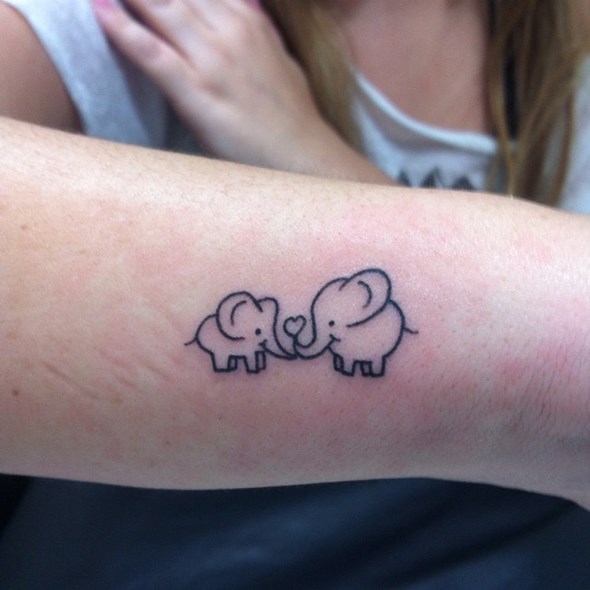  tiny elephant tattoo