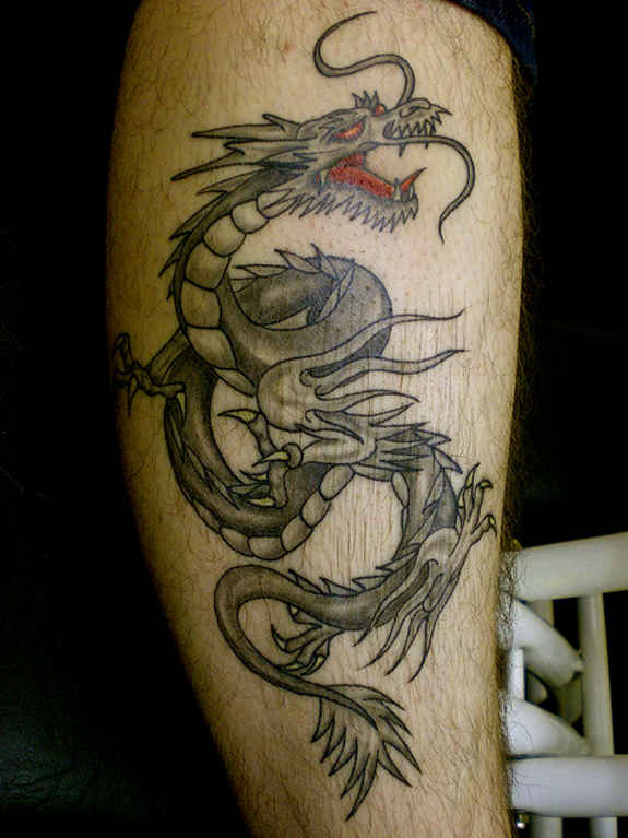  dragon leg tattoos