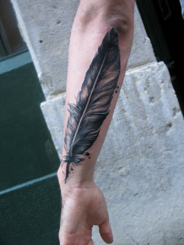 feather tattoo forearm