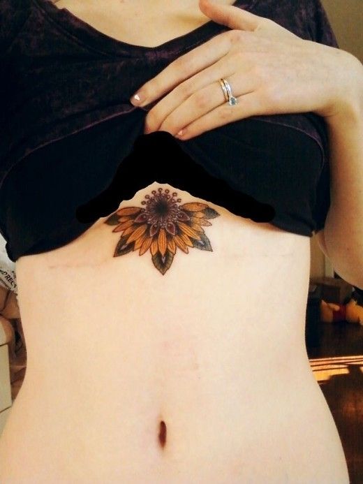 sunflower sternum tattoo