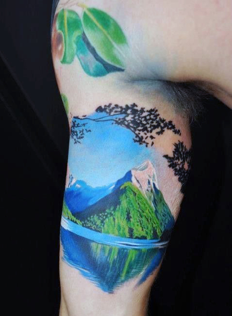 bicep mountain tattoo