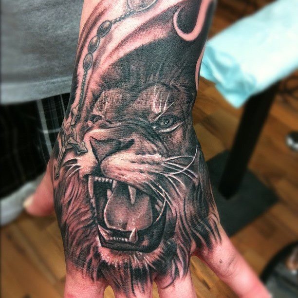  lion hand tattoos