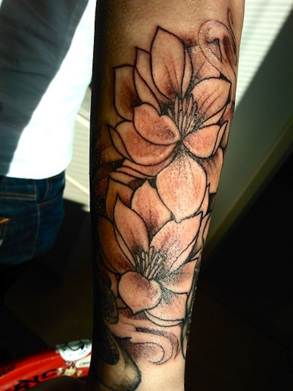 lotus flower tattoo forearm