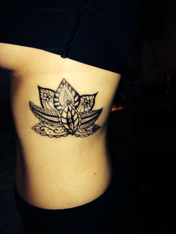 lotus flower tattoo ribs