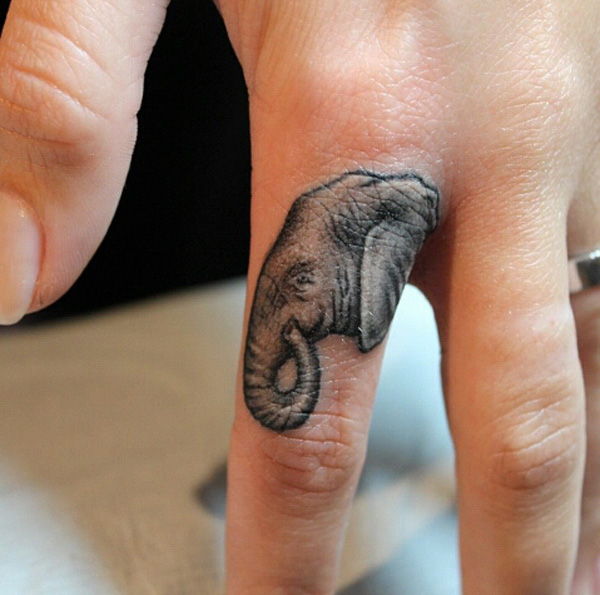  elephant tattoo finger