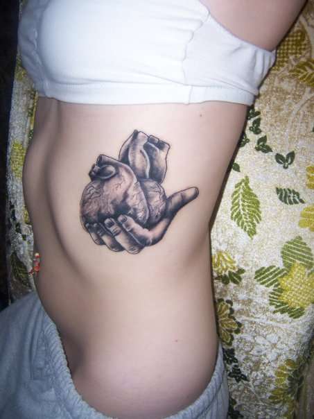  holding hand tattoos