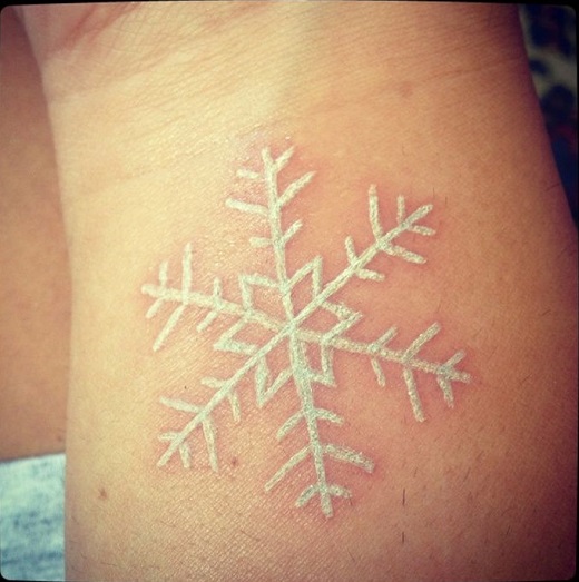 white tattoo snowflake