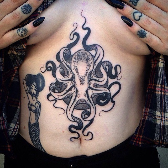  octopus sternum tattoo