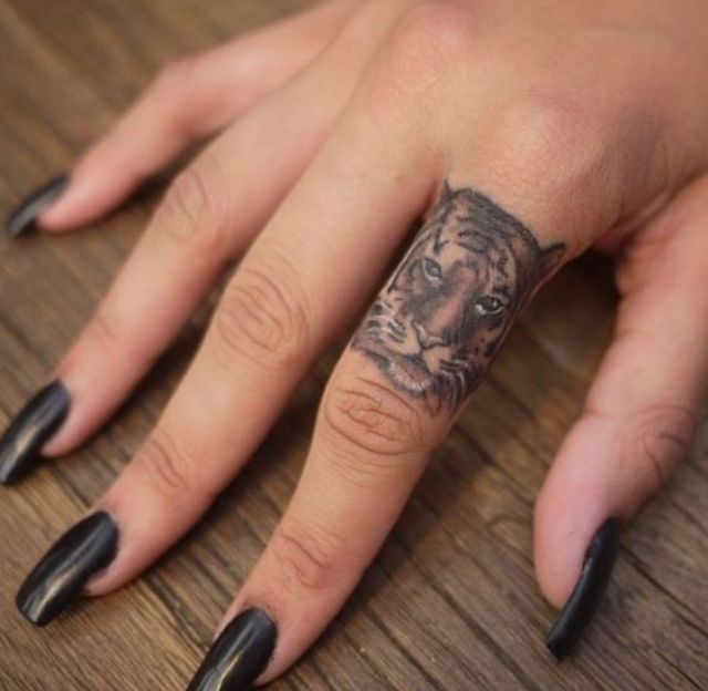 tiger finger tattoos