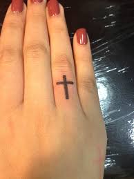 cross tattoos finger