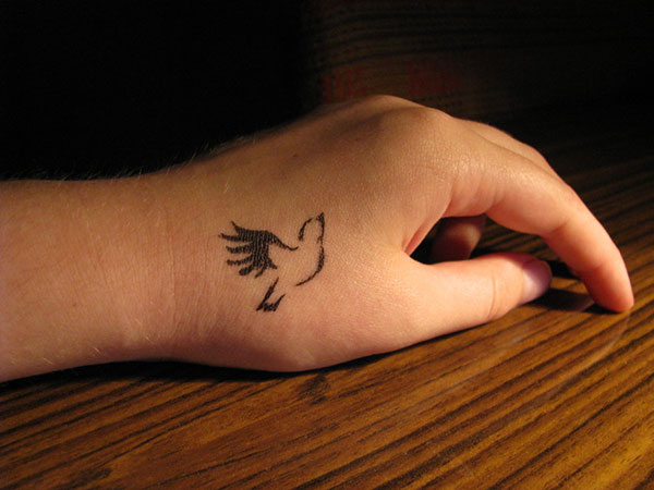 bird hand tattoos