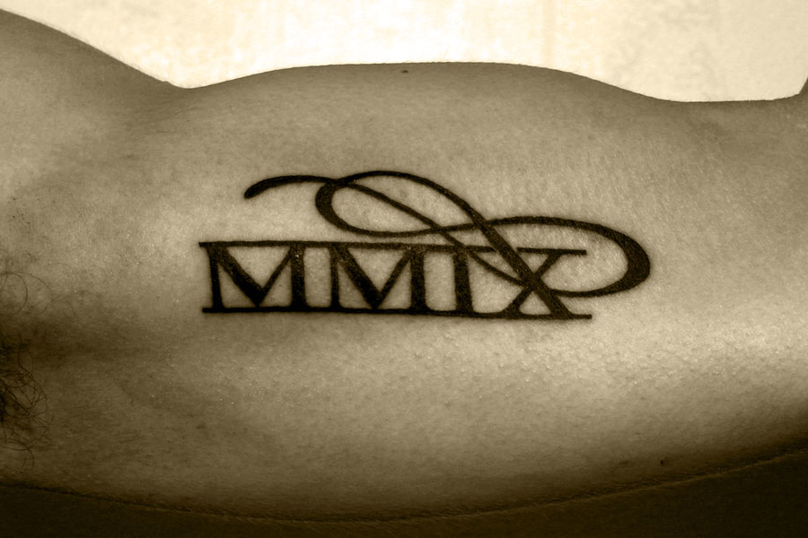  infinity tattoo with roman numerals