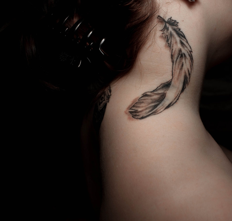 falling feather tattoo