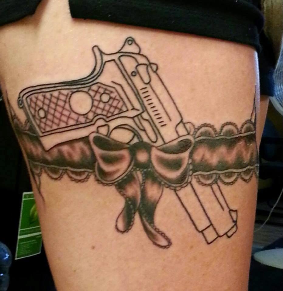  gun thigh tattoos