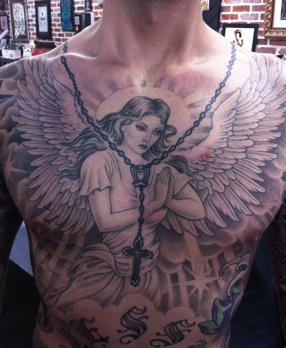 angel chest tattoos