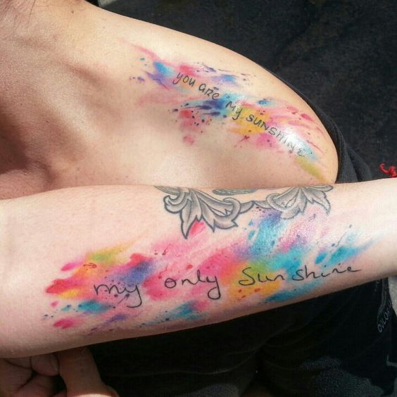 colorful mother daughter tattoos