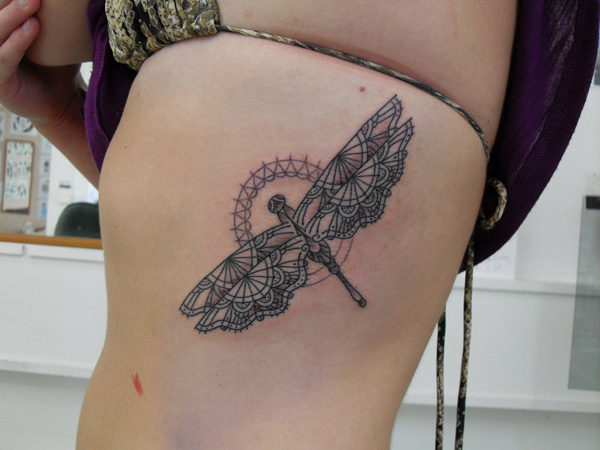 dragonfly sternum tattoo