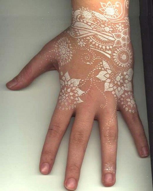  white tattoo hand