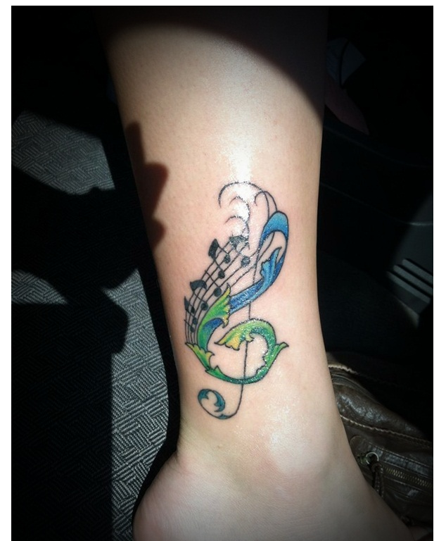 music tattoos leg