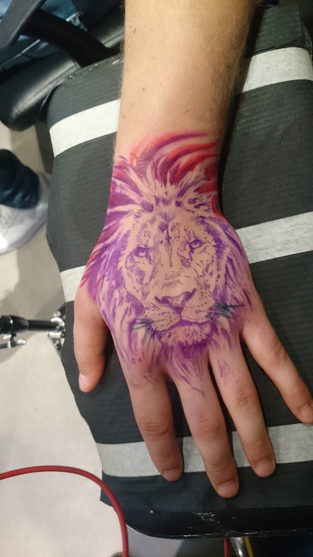  lion tattoo hand