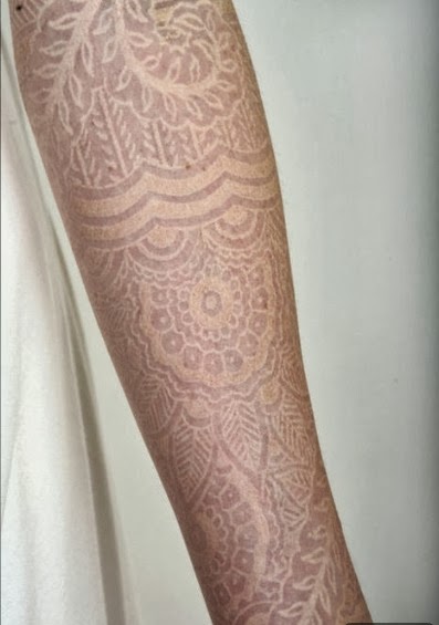  white tattoo arm