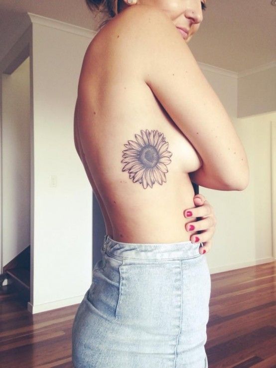 sunflower tattoo on side