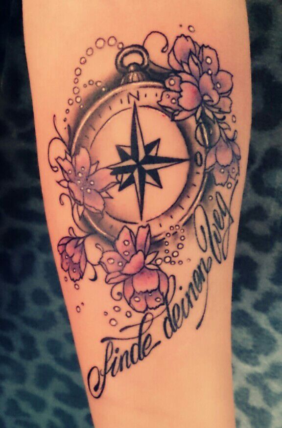 flower compass tattoo