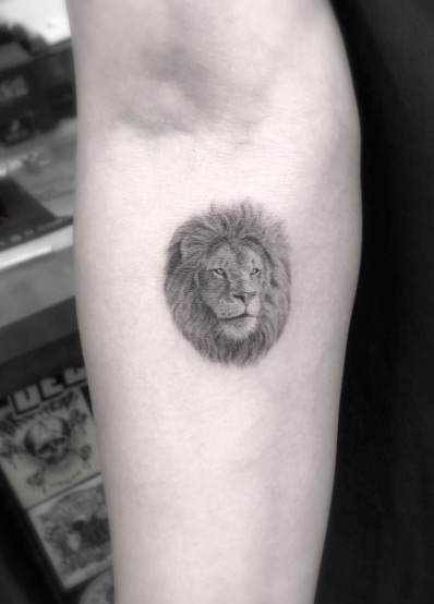  tiny lion tattoo
