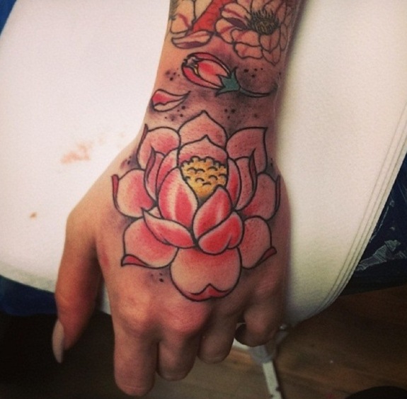 lotus flower tattoo arm