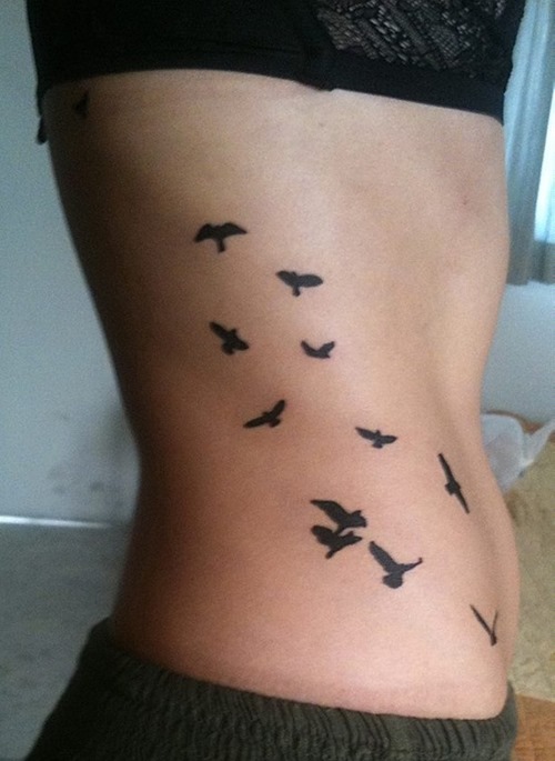  bird tattoos ribs