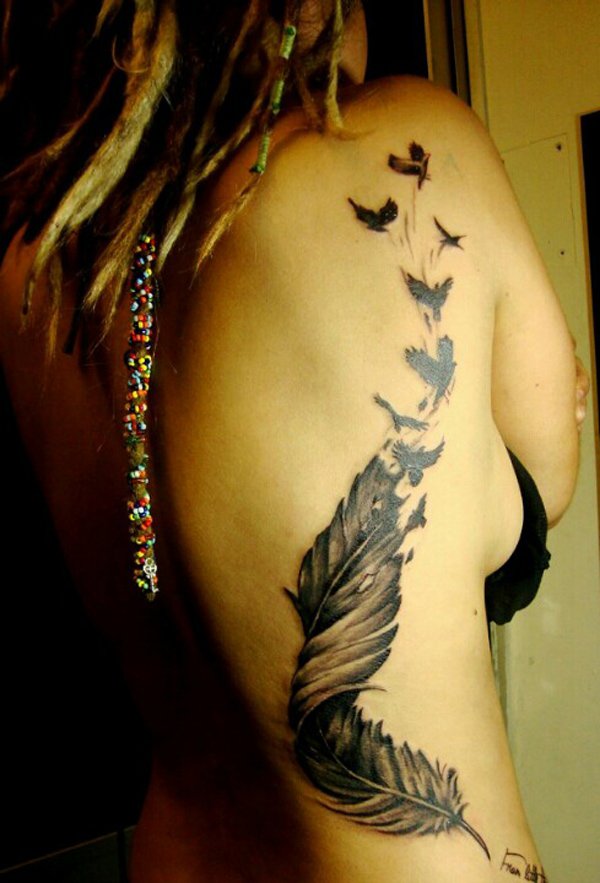  feather tattoo on side