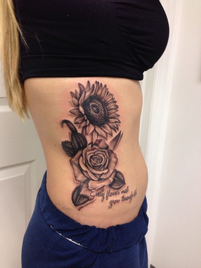 sunflower tattoo ribs