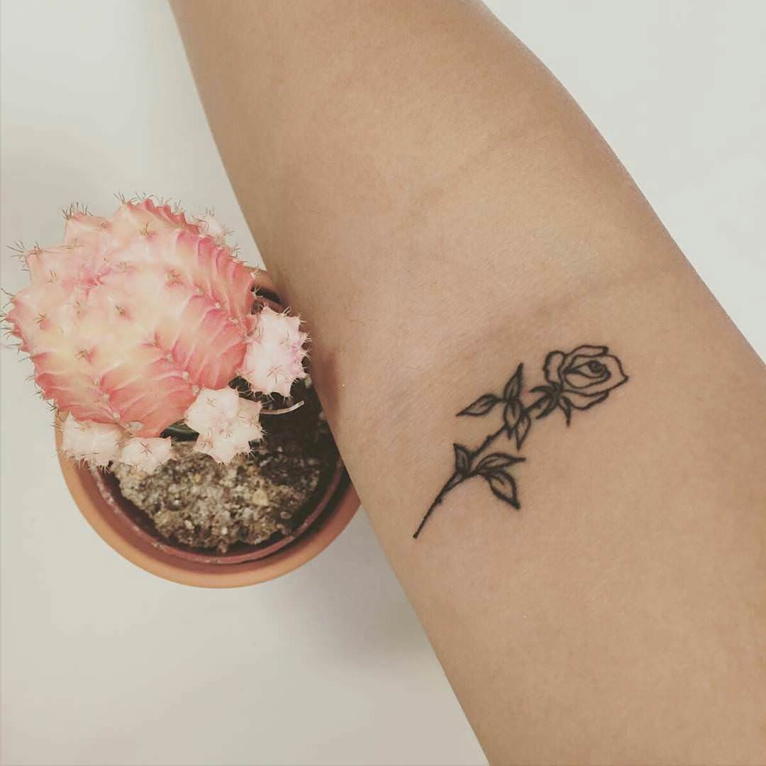  small rose tattoo
