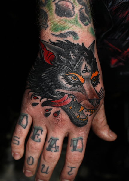 wolf tattoo hand