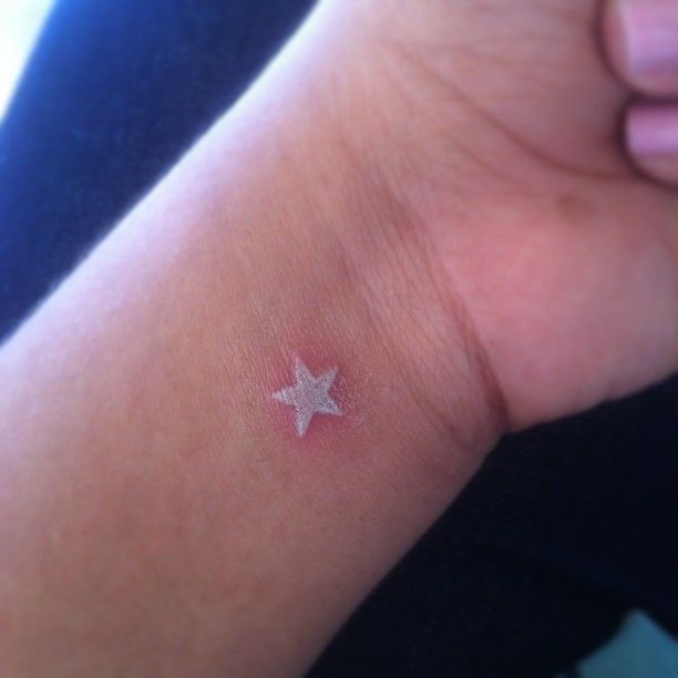  white tattoo star