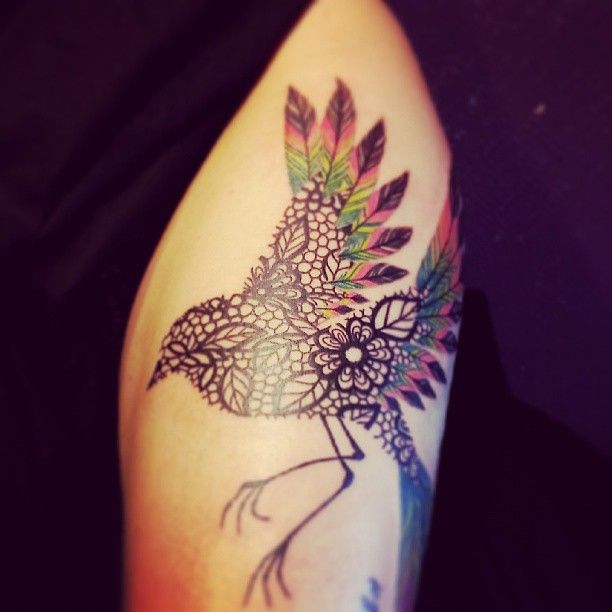 lace bird tattoo