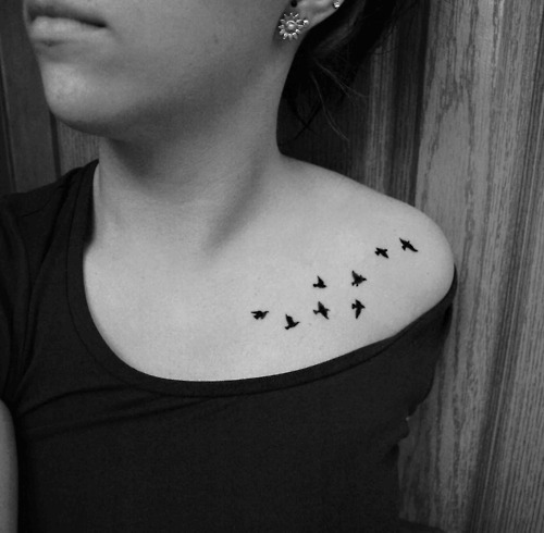 bird tattoos collarbone