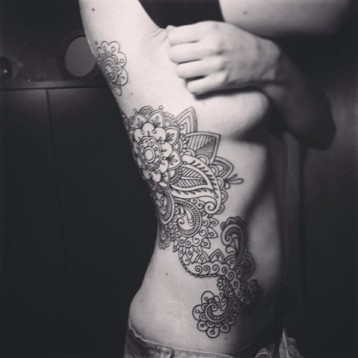 ribs lace tattoo