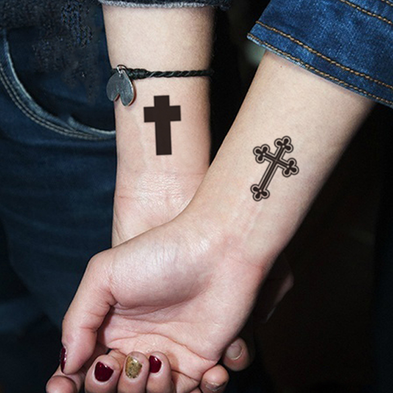 religious couple tattoos