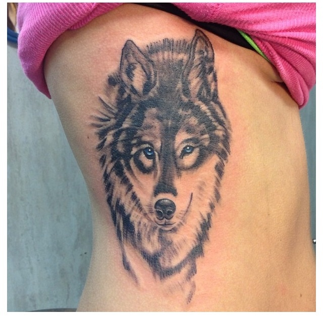 wolf tattoo ribs