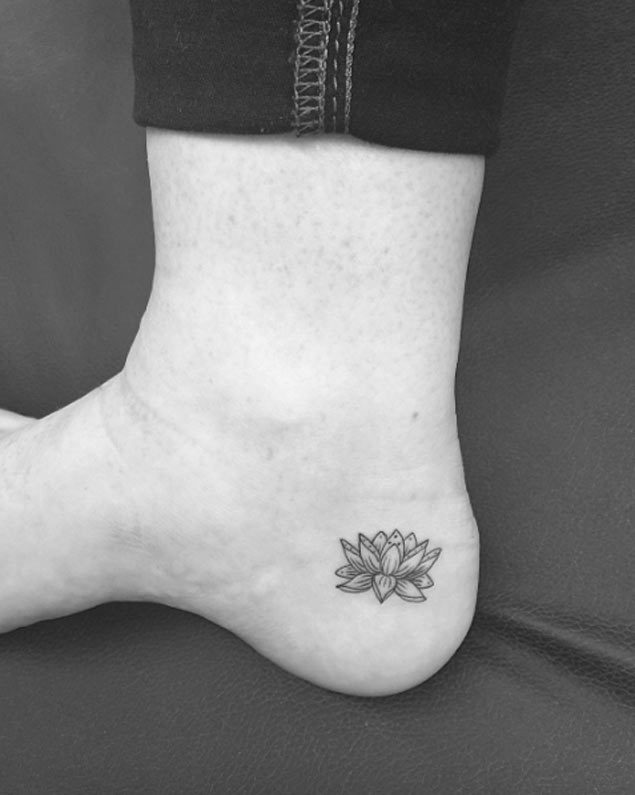  delicate lotus flower tattoo