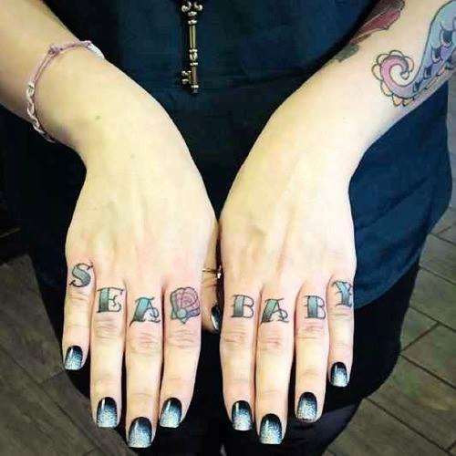  finger tattoos text