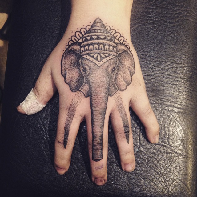  elephant hand tattoos